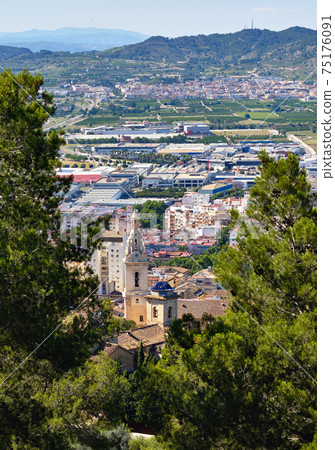 Xativa town against mountains background. Spain Xativa town against mountains background. Spain 75176091
