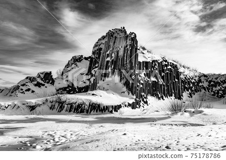 Rock organ pipes in winter time 75178786