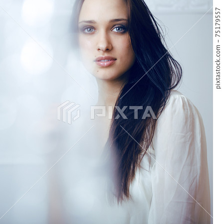 young pretty brunette woman smiling happy on white background smooth blurred, lifestyle people concept young pretty brunette woman smiling happy on white background smooth blurred, lifestyle people concept 75179557