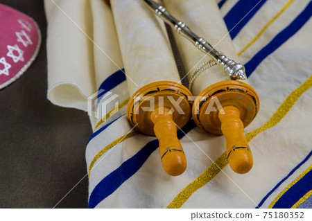 Day of jewish holidays symbols prayer shawl tallit, prayer torah scroll book 75180352