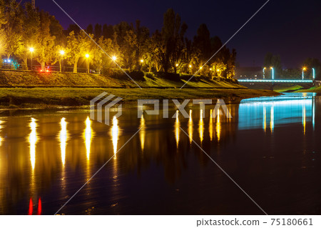 Beautiful reflection of lanterns in the river in the city uzgorod Ukraine. 75180661