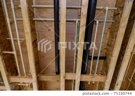 Under construction new home PVC waste water system rough plumbing Under construction new home PVC waste water system rough plumbing 75180744