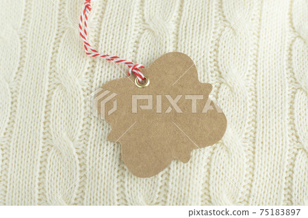 Tag mock-up on white knitwear Tag mock-up on white knitwear 75183897