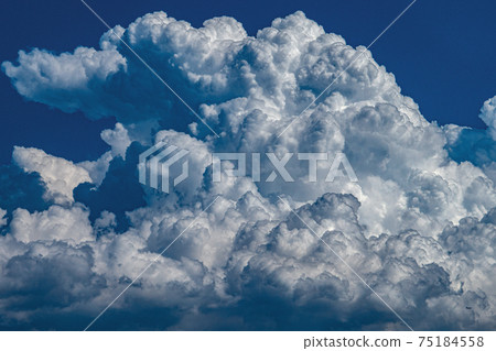 Magnificent cumulonimbus clouds in the summer sky Magnificent cumulonimbus clouds in the summer sky 75184558