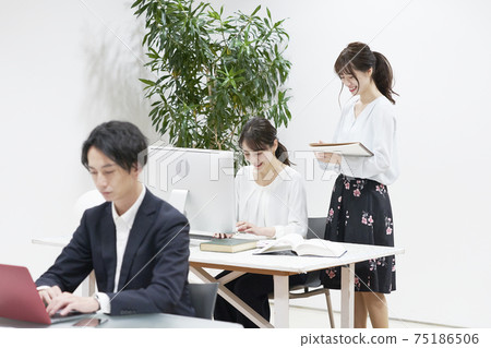 Office worker working in the office Office worker working in the office 75186506