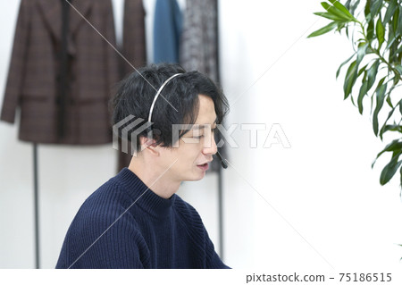 Fashion designer working in the office Video call Fashion designer working in the office Video call 75186515