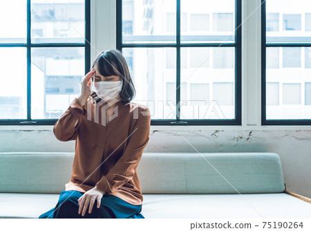 Women's headache in mask 75190264