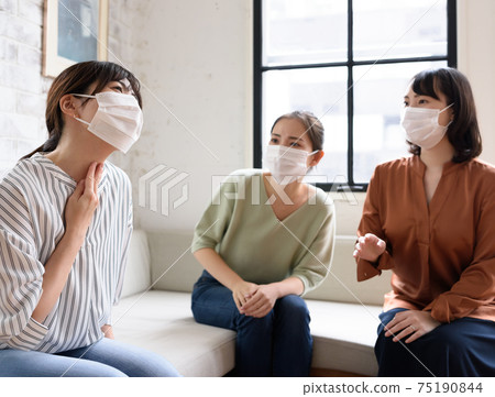 Friends worried about coughing women 75190844