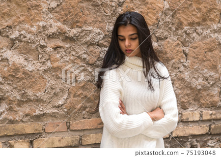 Portrait of a young romantic brunette woman. Outdoors Portrait of a young romantic brunette woman. Outdoors 75193048