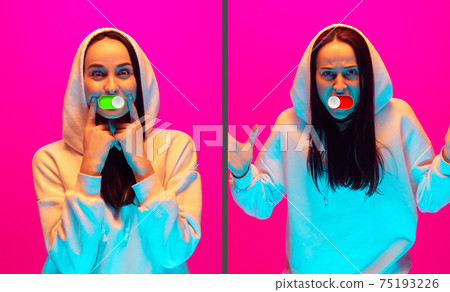 Mood switch on female face. Happy and angry, splitting personality. Modern interface and human emotions Mood switch on female face. Happy and angry, splitting personality. Modern interface and human emotions 75193226