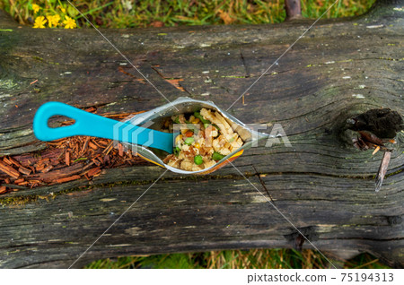 Tourist food in a package. Tourist breakfast in the hike. Omelet in an airtight bag. Tourist food in a package. Tourist breakfast in the hike. Omelet in an airtight bag. 75194313