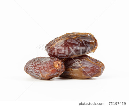 bunch of dried dates isolated on white background bunch of dried dates isolated on white background 75197459
