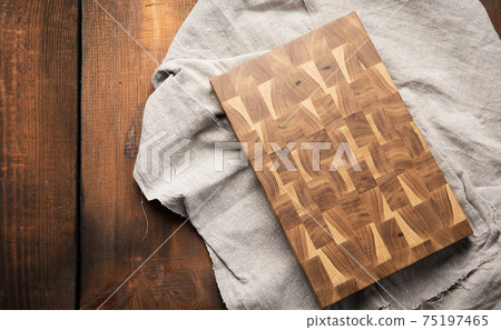 empty rectangular wooden cutting kitchen board on table 75197465