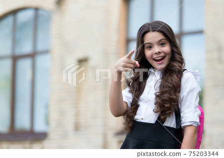 Changing lives and giving choices. Happy child pointing 75203344