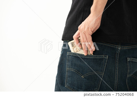 A man who puts money in his pocket, back view 75204068