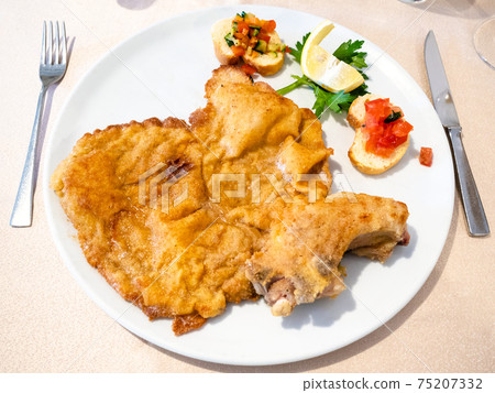 top view of Cotoletta alla Milanese on plate 75207332
