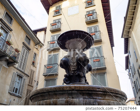 fountain San Pancrazio and old houses in Bergamo 75207444