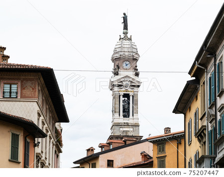 bell tower of Basilica over residential houses 75207447