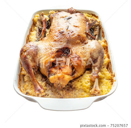 baked duck stuffed with apples and millet porridge baked duck stuffed with apples and millet porridge 75207657