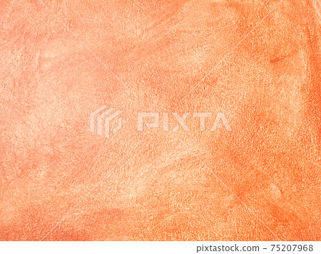 orange painted wall glistening in the sunlight 75207968