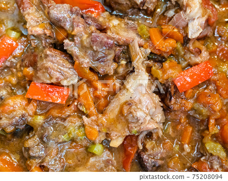 surface of cooked pottage from lamb and vegetables surface of cooked pottage from lamb and vegetables 75208094