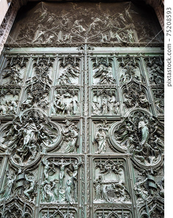 view of outdoor doors of Milan Cathedral view of outdoor doors of Milan Cathedral 75208593