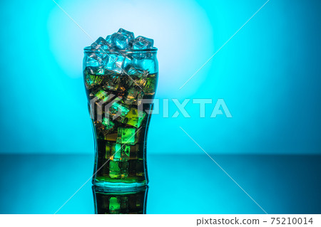 Original glass of Coca Cola with ice and Coca Cola. UK, England, March 3, 2021 Original glass of Coca Cola with ice and Coca Cola. UK, England, March 3, 2021 75210014