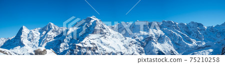 View from Muerren ski region to the famous alpine peaks like Eiger and Jungfrau View from Muerren ski region to the famous alpine peaks like Eiger and Jungfrau 75210258