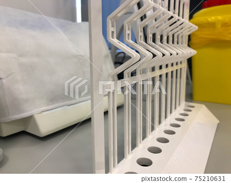medical devices for performing analyzes. racks for holding blood tubes. blood tests in the laboratory, performing manipulations for health medical devices for performing analyzes. racks for holding blood tubes. blood tests in the laboratory, performing manipulations for health 75210631