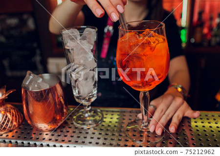 Clinking glasses with alcohol and toasting, party. Clinking glasses with alcohol and toasting, party. 75212962