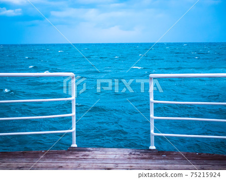 Pier, Ocean, Spoiled vacation and bad weather Pier, Ocean, Spoiled vacation and bad weather 75215924