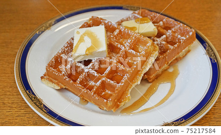 Delicious Belgian waffles Delicious Belgian waffles 75217584