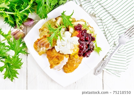 Turkey breast with cranberry sauce on board top Turkey breast with cranberry sauce on board top 75218550