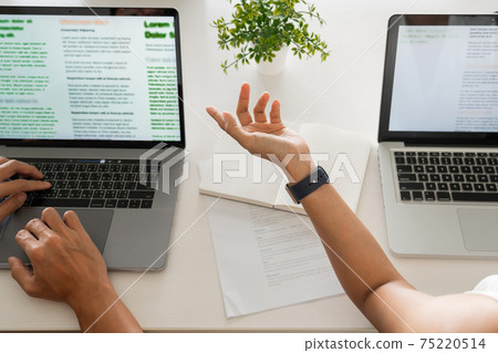 Young students campus helps friend catching up and learning tutoring. People, learning, education and school concept Young students campus helps friend catching up and learning tutoring. People, learning, education and school concept 75220514