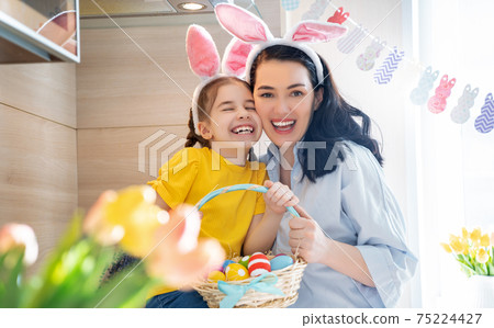 Family celebrating Easter Family celebrating Easter 75224427
