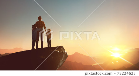 Happy family at sunset. 75224625
