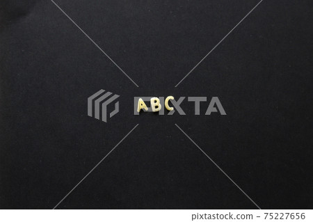 Lined up pasta letters "ABC" Lined up pasta letters "ABC" 75227656