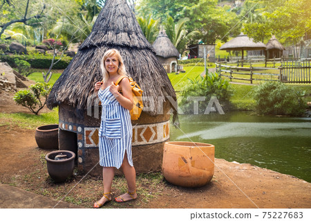 A girl traveler walks on the island of Mauritius.VALEBAT CASELA PARK,Casela Nature Valebat Facilities in Mauritius 75227683