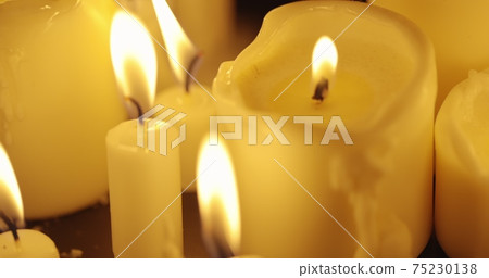 Candles on table closeup photo Candles on table closeup photo 75230138