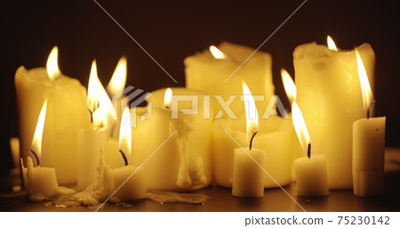 Candles on table closeup photo Candles on table closeup photo 75230142