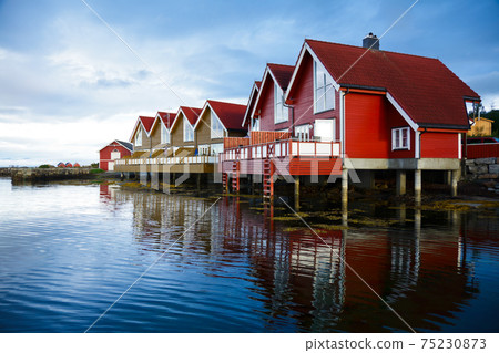 Camping cabins on a fjord 75230873