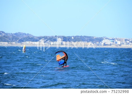 Chigasaki coast gliding through the sea with wing sap 75232998
