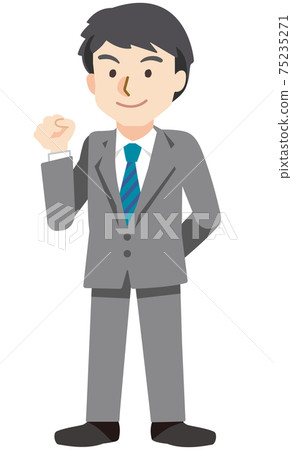 A businessman who makes a guts pose while smiling 75235271