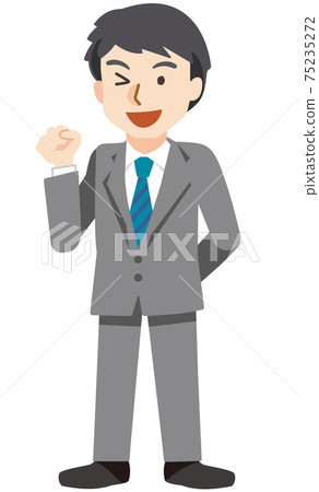 A businessman who winks and makes a guts pose with a smile 75235272