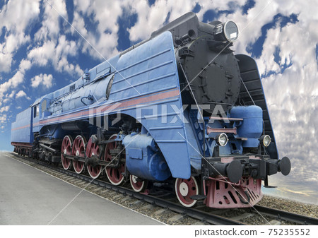 The blue express steam locomotive which is accelerating momentum 125 km/hour The blue express steam locomotive which is accelerating momentum 125 km/hour 75235552