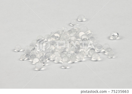 Polymer pellets. Pile of silica gel. 75235663
