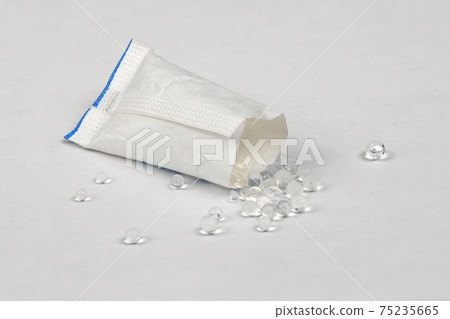 Polymer pellets. Pile of silica gel. 75235665