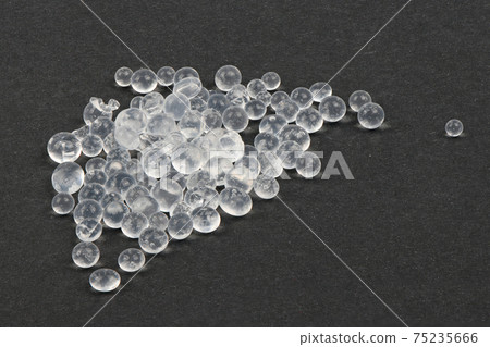 Polymer pellets. Pile of silica gel. 75235666