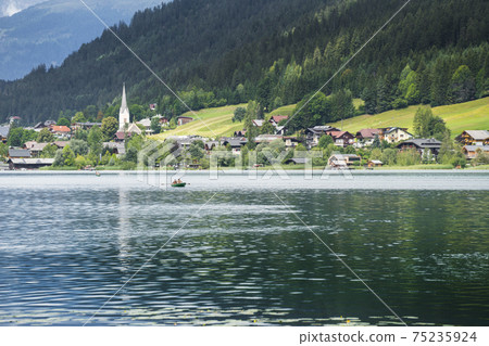 Relaxing on the lake in summer Relaxing on the lake in summer 75235924