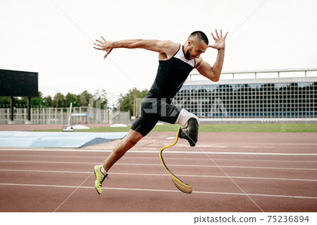 disabled male runner on prosthetic leg disabled male runner on prosthetic leg 75236894
